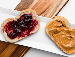 Slices of bread with jam and peanut butter