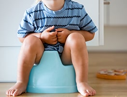 Toddler sitting on a potty