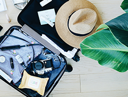Travel items in a suitcase